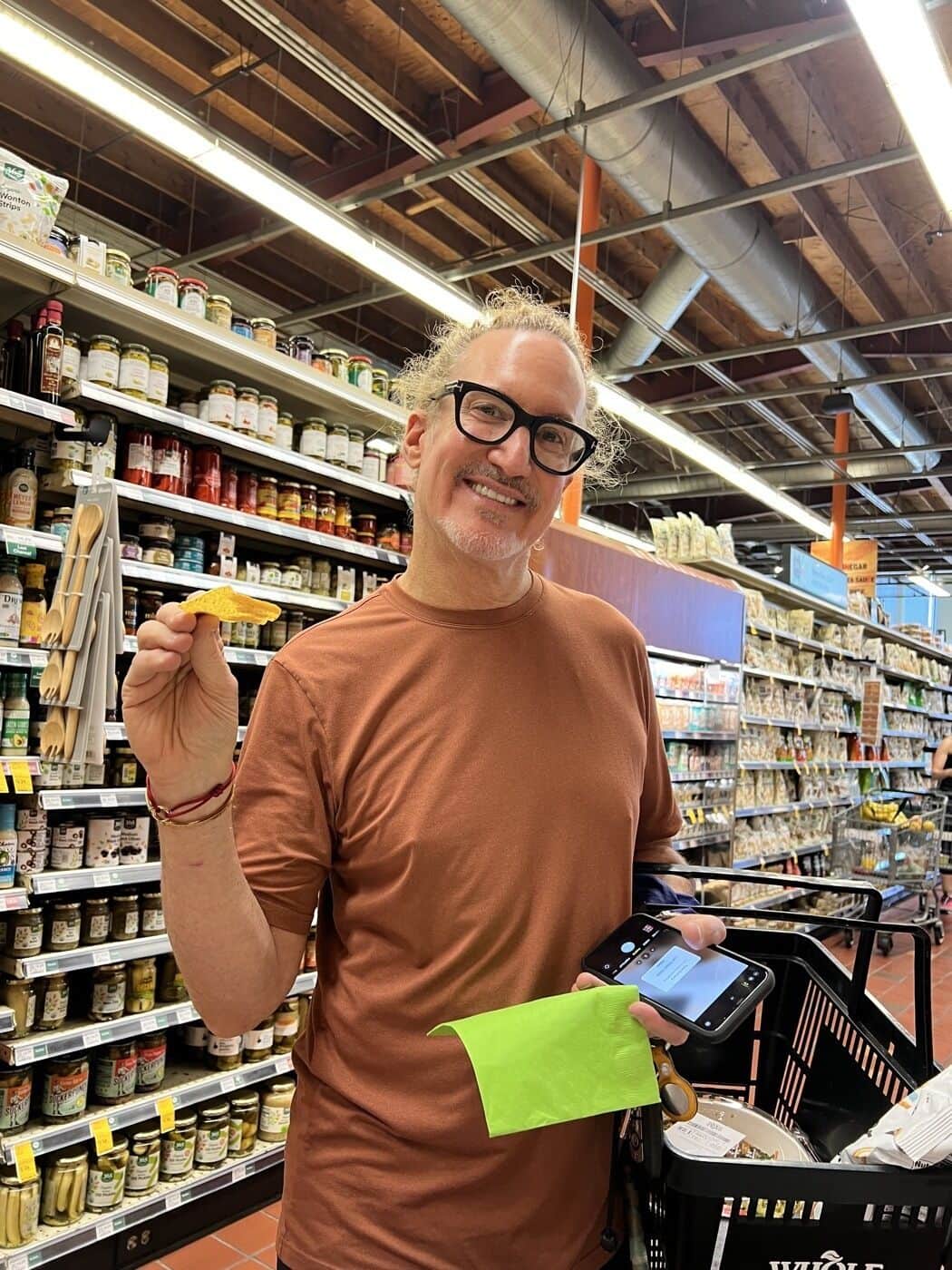 Shopper tasting Tango at Whole Foods